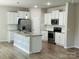Modern kitchen with stainless steel appliances and an island at 229 Lake George Dr, Shelby, NC 28152