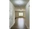 Hallway view into living room with hardwood floors at 229 Lake George Dr, Shelby, NC 28152