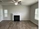 Living room with fireplace and hardwood floors at 229 Lake George Dr, Shelby, NC 28152