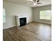 Living room with fireplace and hardwood floors at 229 Lake George Dr, Shelby, NC 28152
