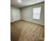 Bright bedroom with neutral carpeting and double doors at 229 Lake George Dr, Shelby, NC 28152
