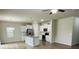 Open concept kitchen and living area with hardwood floors and ceiling fan at 229 Lake George Dr, Shelby, NC 28152