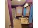 Bathroom with purple walls, shower/tub combo, and vanity at 309 Bost Nursery Rd, Maiden, NC 28650