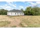 House exterior showcasing backyard and landscaping at 113 Oakwood Dr, Kings Mountain, NC 28086