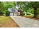 House exterior with driveway and landscaping at 9116 Old Barnette Pl, Huntersville, NC 28078