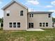 Two story house exterior with siding and small patio at 4608 Brookwood Rd, Charlotte, NC 28215