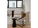 Bright home office with a comfortable chair and large window at 237 Marsh Rd # 101, Charlotte, NC 28209