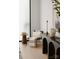 Minimalist sitting area with a black console table and comfy chair at 237 Marsh Rd # 101, Charlotte, NC 28209