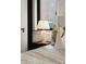 Elegant bedroom with a marble lamp, patterned pillows, and a cozy bed at 237 Marsh Rd # 101, Charlotte, NC 28209
