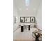 Bright home office with a large window, stylish desk, and comfortable chair at 237 Marsh Rd # 101, Charlotte, NC 28209