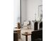Minimalist sitting area with a black console table and comfy chair at 237 Marsh Rd # 101, Charlotte, NC 28209