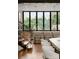 Modern kitchen with a large island and stunning window views at 237 Marsh Rd # 101, Charlotte, NC 28209