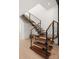 Modern floating staircase with glass and metal railing at 237 Marsh Rd # 101, Charlotte, NC 28209