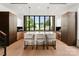 Contemporary kitchen with wood and white cabinets, a large island, and stainless steel appliances at 237 Marsh Rd # 101, Charlotte, NC 28209