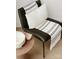 Cozy sitting area with a comfortable chair and warm throw blanket at 237 Marsh Rd # 101, Charlotte, NC 28209