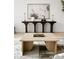Modern living room with light oak coffee table and black console table at 237 Marsh Rd # 101, Charlotte, NC 28209