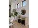 Elegant entryway with console table, mirror, and stylish decor at 237 Marsh Rd # 101, Charlotte, NC 28209