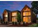 Three modern brown homes with large windows and metal roofs at 237 Marsh Rd # 101, Charlotte, NC 28209
