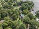 Aerial view of home with pool and private dock at 18032 Nantz Rd, Cornelius, NC 28031