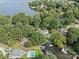 Aerial view showing house, pool, and waterfront access at 18032 Nantz Rd, Cornelius, NC 28031