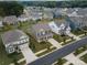 Aerial view of a new home community with multiple houses and landscaping at 3141 Stephen Pace Trl, Huntersville, NC 28078