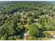 Aerial view showing house, yard, and surrounding neighborhood at 220 Winterlocken Rd, Salisbury, NC 28144