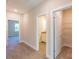 Hallway with carpet, linen closet, and access to bedrooms and bathroom at 3221 Player Ct, Salisbury, NC 28144