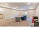 Finished basement with seating area and a desk at 3221 Player Ct, Salisbury, NC 28144