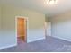 Well-lit bedroom with walk-in closet and neutral color scheme at 3221 Player Ct, Salisbury, NC 28144