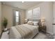 Cozy bedroom with neutral decor at 1253 Falling Acorn Ln, Concord, NC 28027