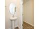 Convenient powder room with pedestal sink at 1253 Falling Acorn Ln, Concord, NC 28027