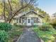 Charming bungalow with a well-maintained lawn and walkway at 3025 Rush Ave, Charlotte, NC 28208