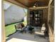 Cozy covered patio with seating area, perfect for outdoor relaxation at 1 Beth Haven Church Rd, Denver, NC 28037