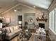 Open living room with stone fireplace and vaulted ceiling at 1 Beth Haven Church Rd, Denver, NC 28037