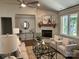 Living room with stone fireplace and neutral decor at 1 Beth Haven Church Rd, Denver, NC 28037