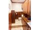 Small bathroom with wood cabinets and tile floor at 1610 Sierra Rd, York, SC 29745