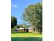 Ranch-style home with a large yard and mature trees at 1610 Sierra Rd, York, SC 29745
