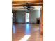 Living room with hardwood floors, ceiling fan and fireplace at 1610 Sierra Rd, York, SC 29745