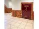 Finished basement with a large safe and wood paneling at 1610 Sierra Rd, York, SC 29745