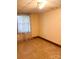 Simple basement room with tile flooring and a window at 1610 Sierra Rd, York, SC 29745