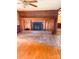 Brick fireplace with wood mantel and hearth in a living room at 1610 Sierra Rd, York, SC 29745