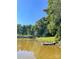 Wooden dock extending over a calm pond at 1610 Sierra Rd, York, SC 29745