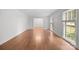 Spacious living room featuring hardwood floors and large windows at 4820 Montclair Ave, Charlotte, NC 28211