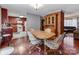 Dining area with kitchen access and a built-in hutch at 11214 Sudbury Rd, Davidson, NC 28036