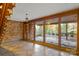 Bright basement area with stone floors and access to backyard at 702 Forest Hill Dr, Shelby, NC 28150