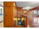 Wood staircase leading down to a finished basement at 702 Forest Hill Dr, Shelby, NC 28150