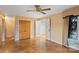 Bright bedroom with wood floors, double doors, and walk-in closet at 702 Forest Hill Dr, Shelby, NC 28150