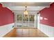 Spacious dining area with hardwood floors and large windows offering natural light at 702 Forest Hill Dr, Shelby, NC 28150