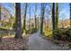 Long driveway leading to a teal ranch home at 702 Forest Hill Dr, Shelby, NC 28150