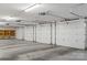 Spacious three-car garage with automatic openers and built-in shelving at 702 Forest Hill Dr, Shelby, NC 28150